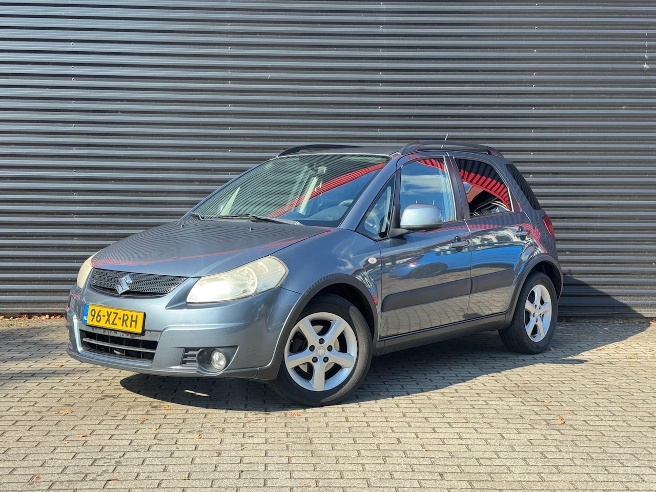 Suzuki SX4 - Suzuki SX4 1.6 Shogun | trekhaak | airco | licht metalen velgen - AutoWereld.nl