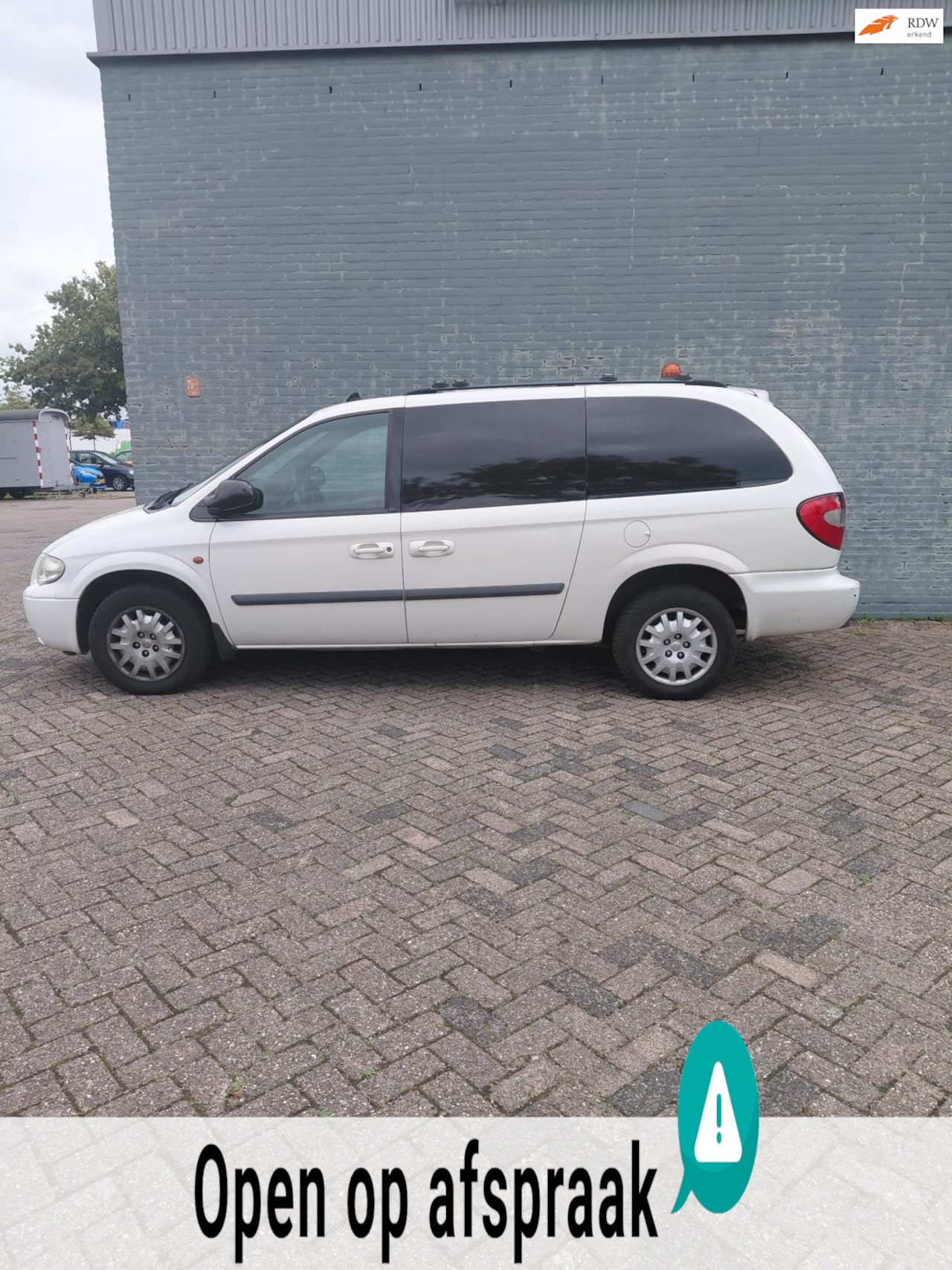 Chrysler Grand Voyager - 2.8 CRD SE High Roof 2.8 CRD SE High Roof - AutoWereld.nl