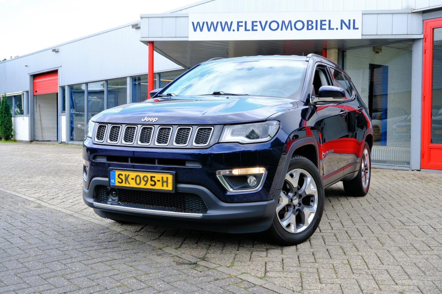 Jeep Compass - 1.4 140pk MultiAir Opening Edition Plus Leder|Navi|Clima|LMV - AutoWereld.nl