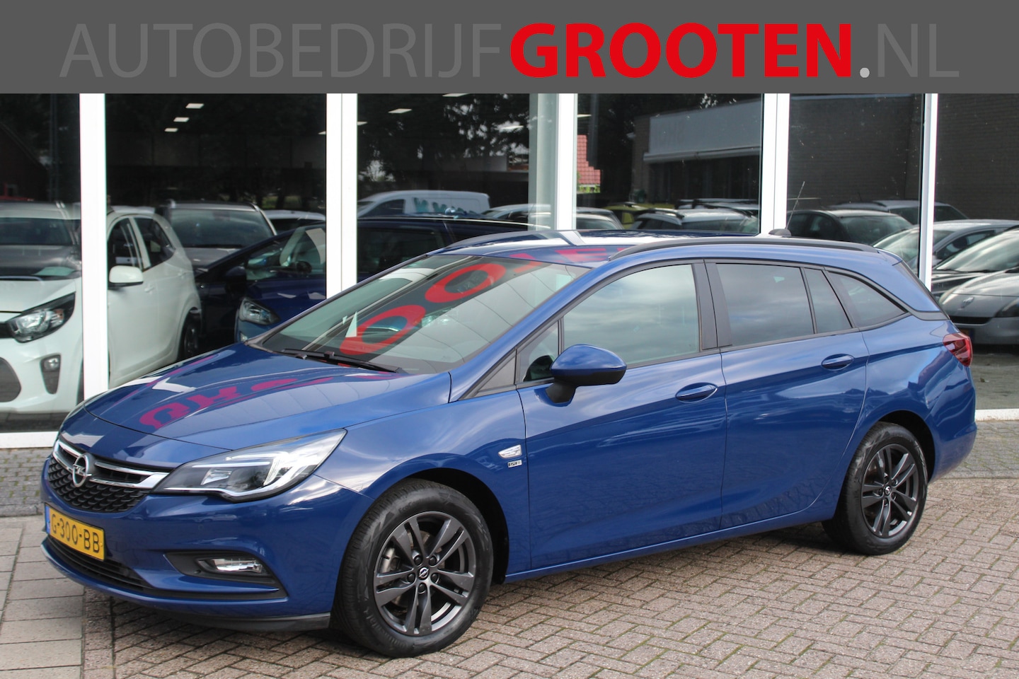 Opel Astra Sports Tourer - 1.4 Turbo 120 Jaar Edition//NAVI//150PK!! - AutoWereld.nl
