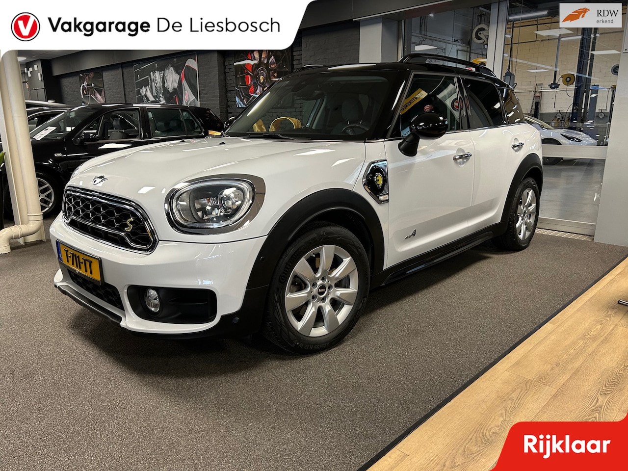 MINI Countryman - Mini 2.0 Cooper S E ALL4 Chili / Airco / PDC / Navigatie / - AutoWereld.nl