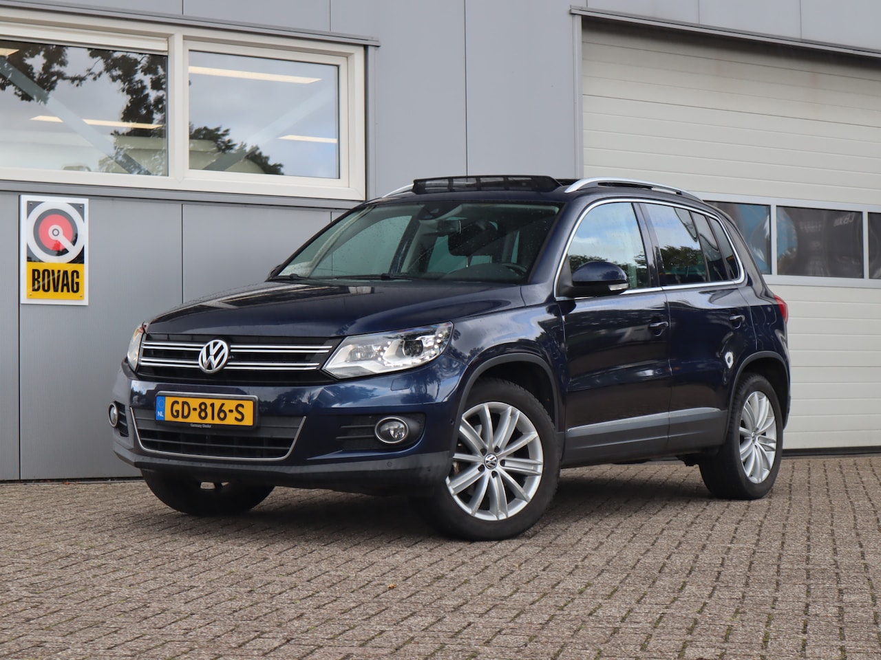 Volkswagen Tiguan - 2.0 TSI Sport&Style 4Motion / Trekhaak / Pano / Leder / Dynaudio - AutoWereld.nl