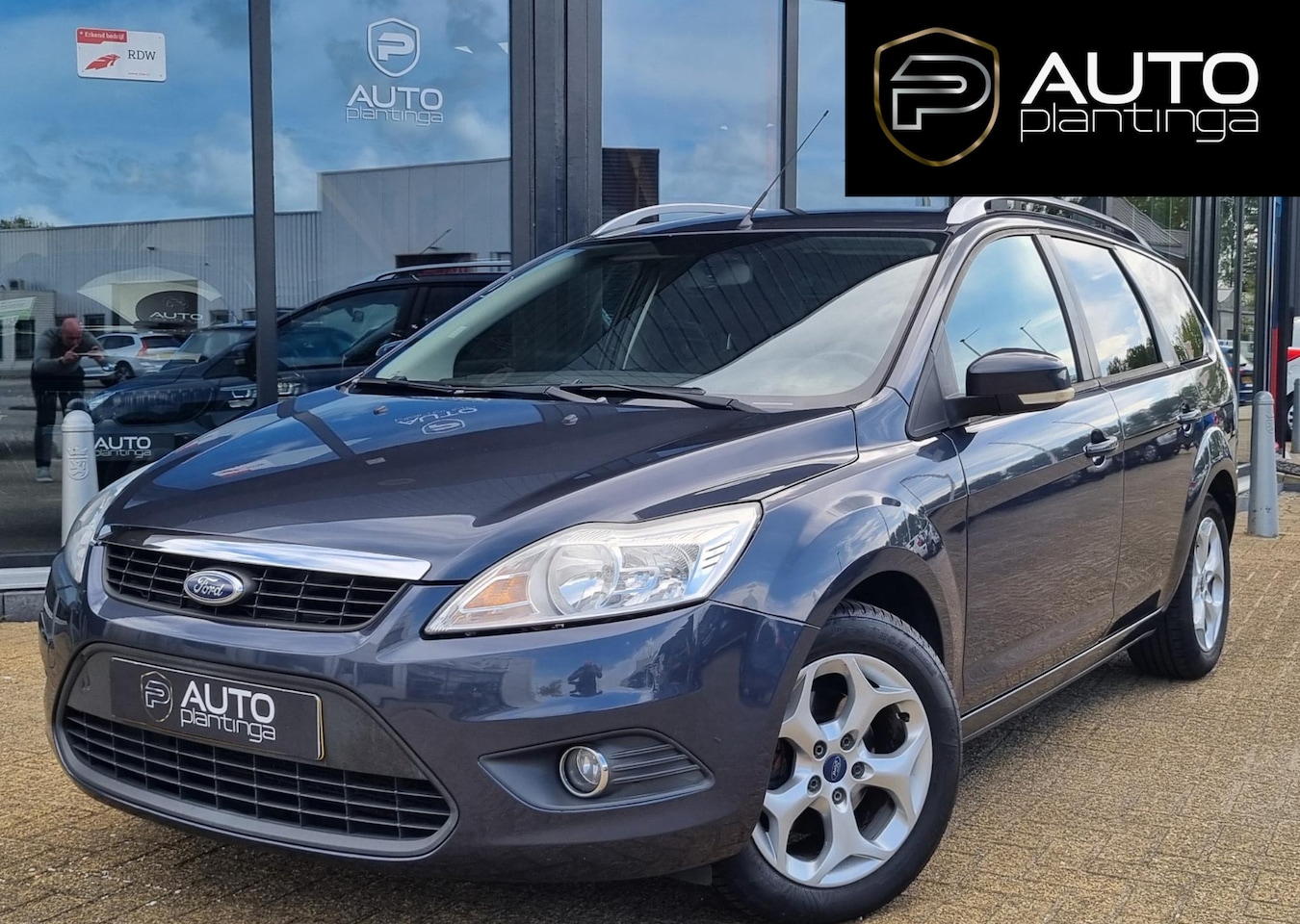 Ford Focus Wagon - 1.6 Cool & Sound 101PK | Trekhaak | Airco | Voorruitverwarming | Sony Audio | Lichtmetalen - AutoWereld.nl
