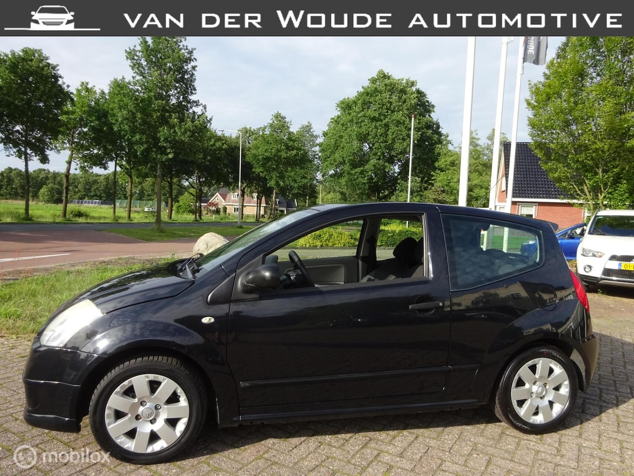 Citroën C2 - 1.4i Caractère '07 Sport|LM wielen|9-7-2026 APK! - AutoWereld.nl