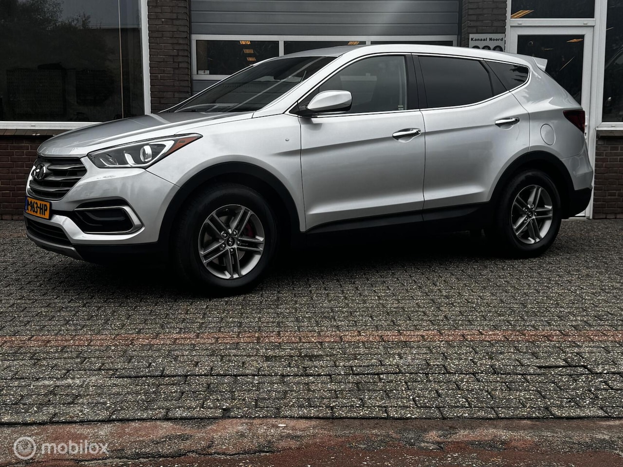 Hyundai Santa Fe - 2.4 GDI AUT CAMERA/AIRCO/CRUISE/BLUETOOTH - AutoWereld.nl