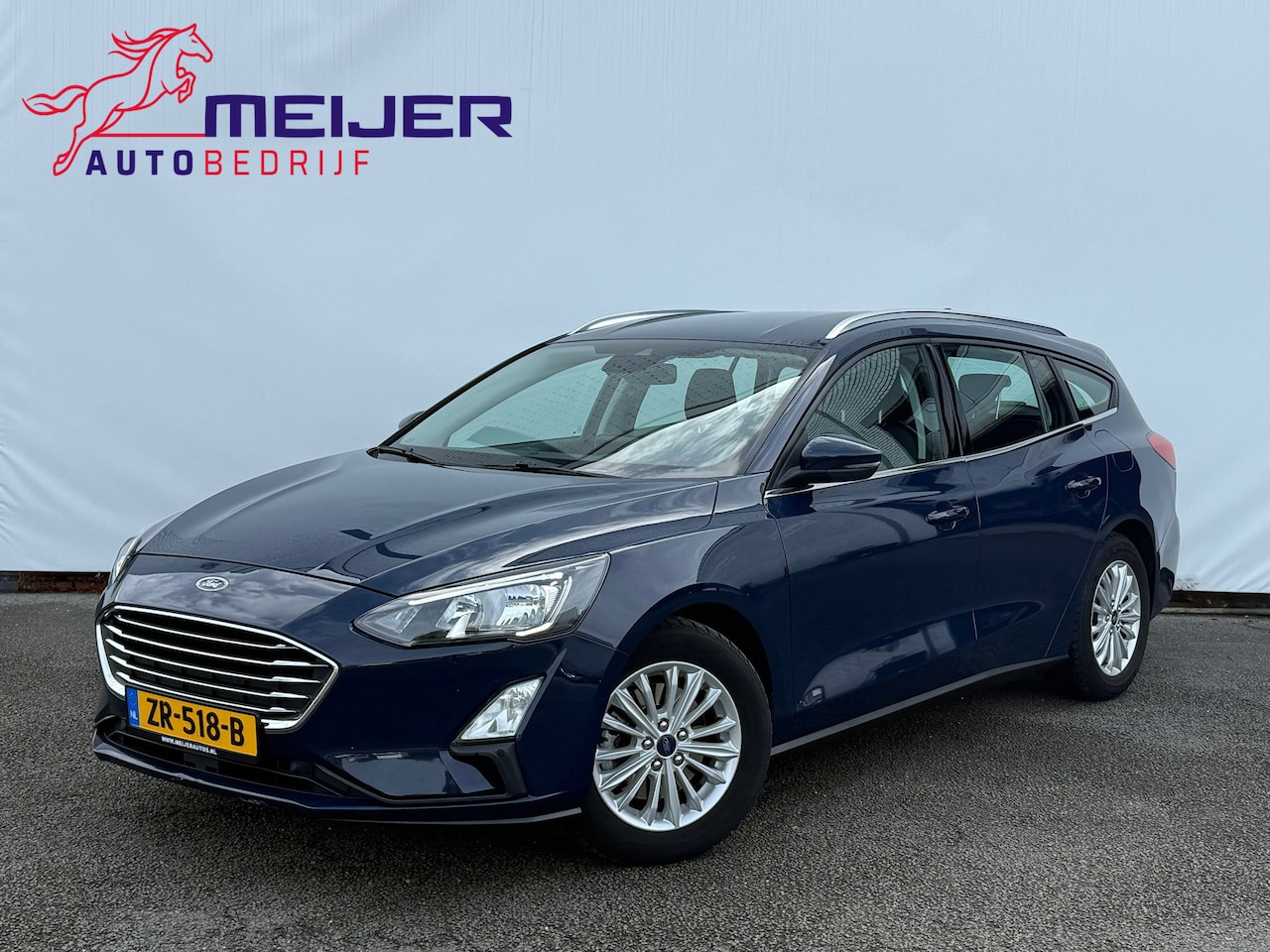 Ford Focus Wagon - 1.0 EcoBoost Titanium Business Navigatie | Cruise | Keyless | Sportvelgen | Parkeersensore - AutoWereld.nl