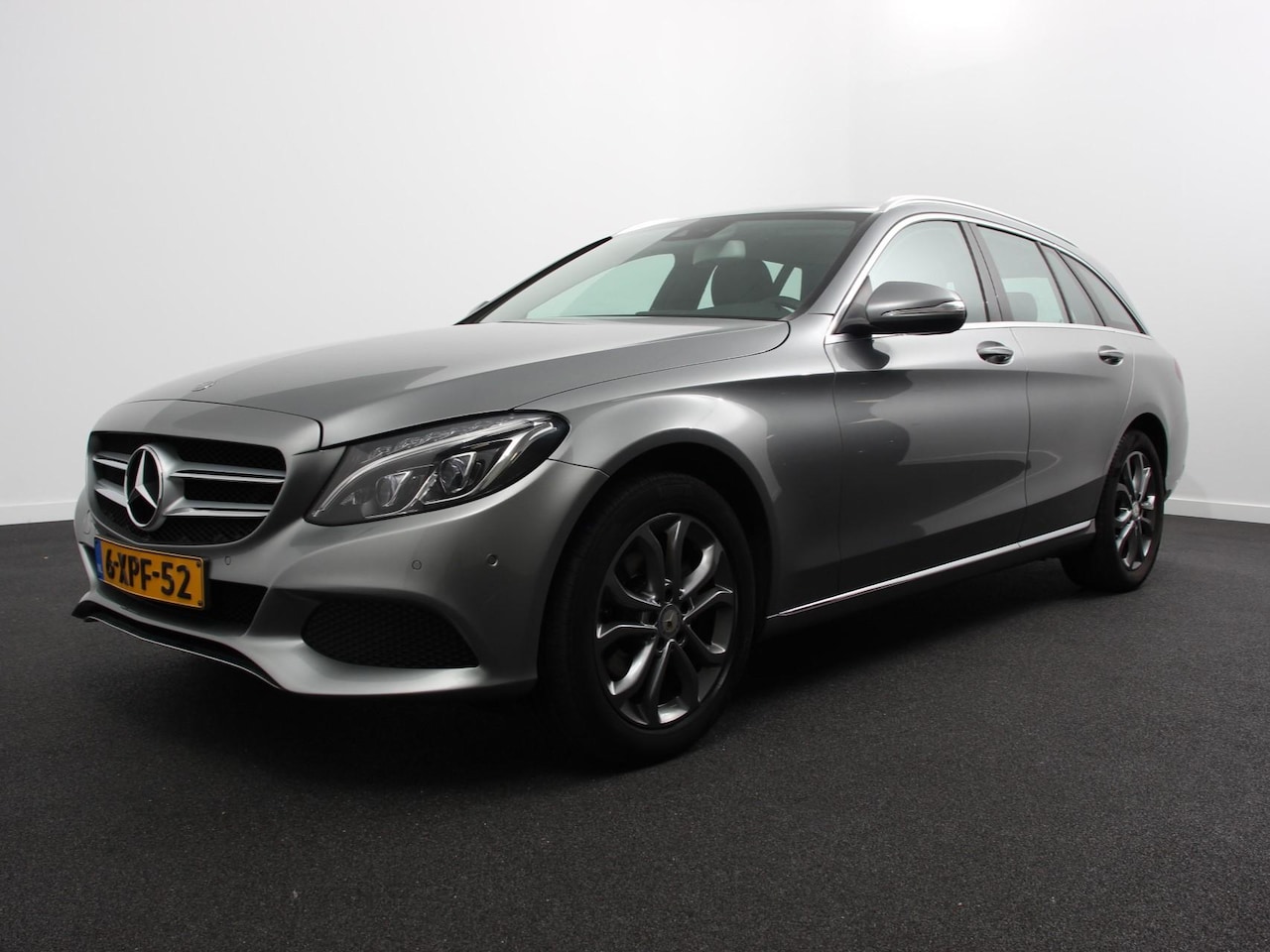 Mercedes-Benz C-klasse Estate - 180 Ambition automaat Clima control leder navigatie lichtmetalen velgen parksensoren cruis - AutoWereld.nl