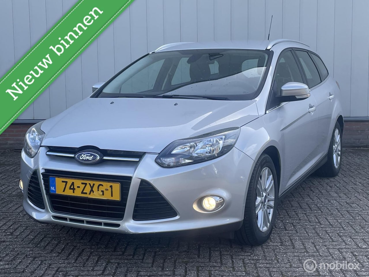 Ford Focus Wagon - 1.0 EcoBoost Titanium | 1e eigenaar | Dealeronderhouden | Navigatie | PDC | LMV | - AutoWereld.nl