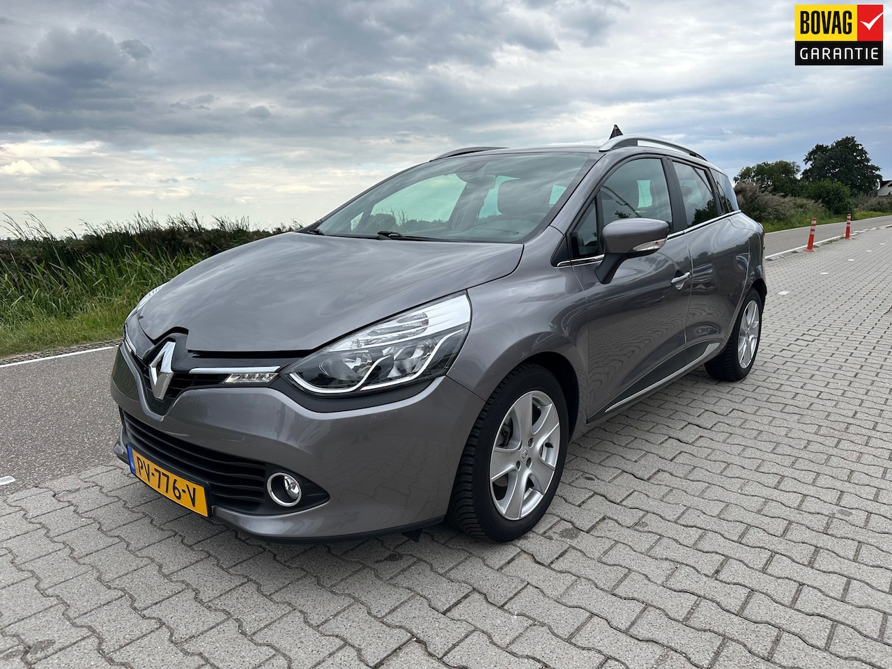 Renault Clio Estate - 1.2 Dynamique Navi, Cruisecontrol, Climatcontrol, PDC - AutoWereld.nl