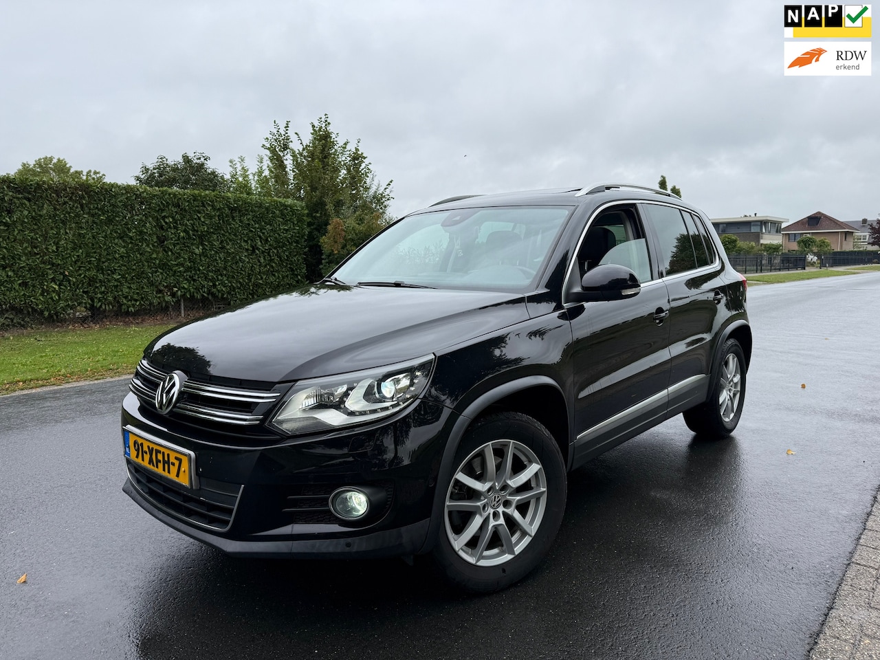 Volkswagen Tiguan - 1.4 TSI Sport&Style PANO/LEER/NAVI/APK - AutoWereld.nl