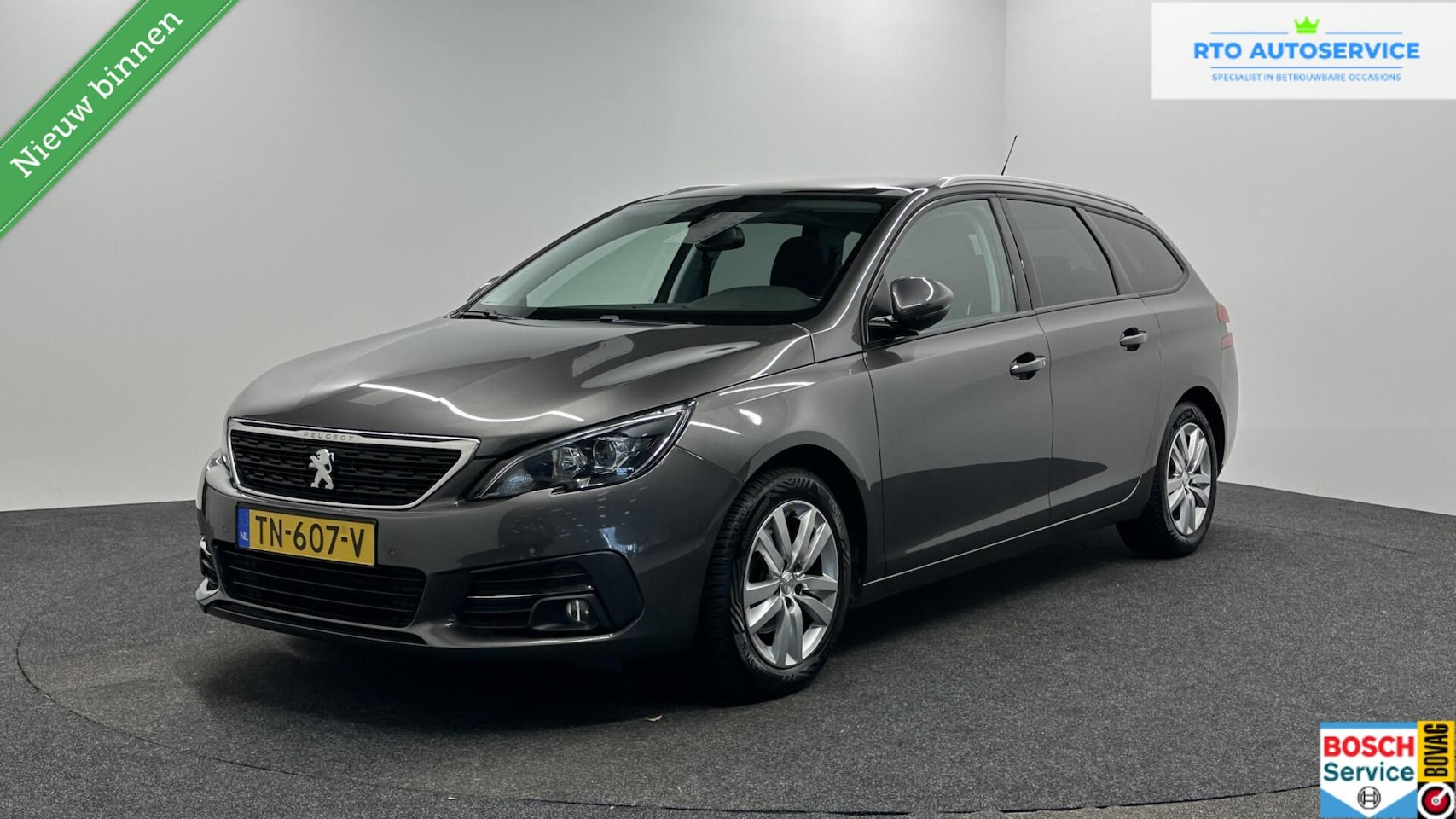 Peugeot 308 SW - 1.2 PureTech Blue Lease Premium PANO NAVI ECC CRUISE CARPLAY. - AutoWereld.nl