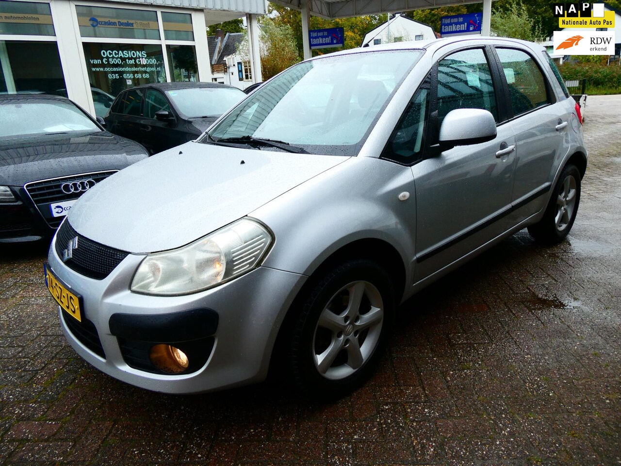 Suzuki SX4 - 1.6 Exclusive 107pk Clima 144.000km. Trekhaak 1200kg. Hoge instap - AutoWereld.nl