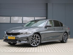 BMW 3-serie - 330i Sport | schuifkanteldak | 360 camera | harmankardon | adap. cruise | dodehoekdetectie