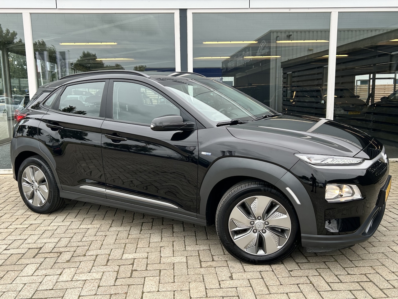 Hyundai Kona Electric - EV Comfort 64 kWh 50% deal 7.975,- ACTIE Camera / Telefoon / Clima / Cruise - AutoWereld.nl