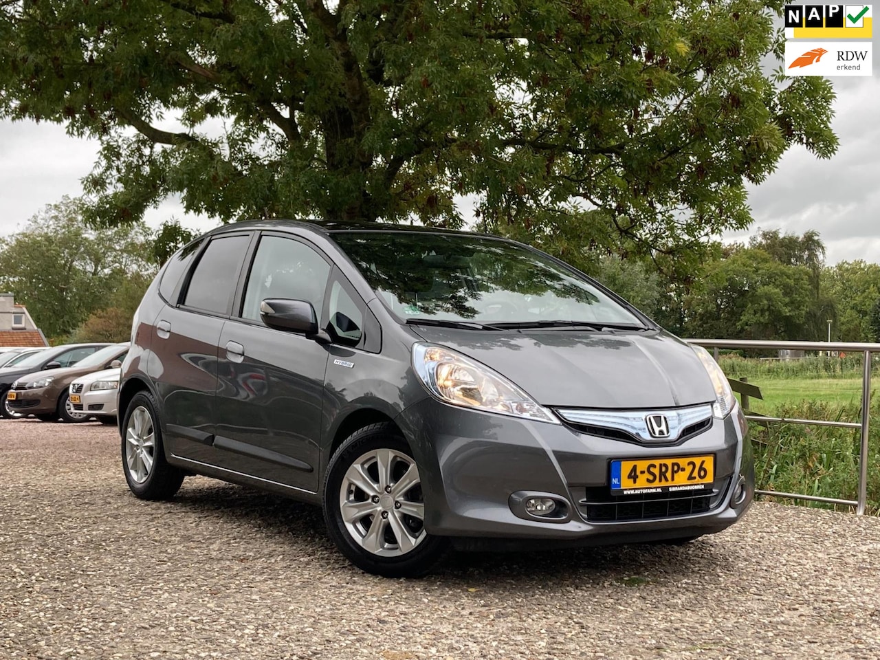 Honda Jazz - 1.4 Hybrid | Leder + Stoelverw. + Clima + Cruise nu €8.975,-!! - AutoWereld.nl
