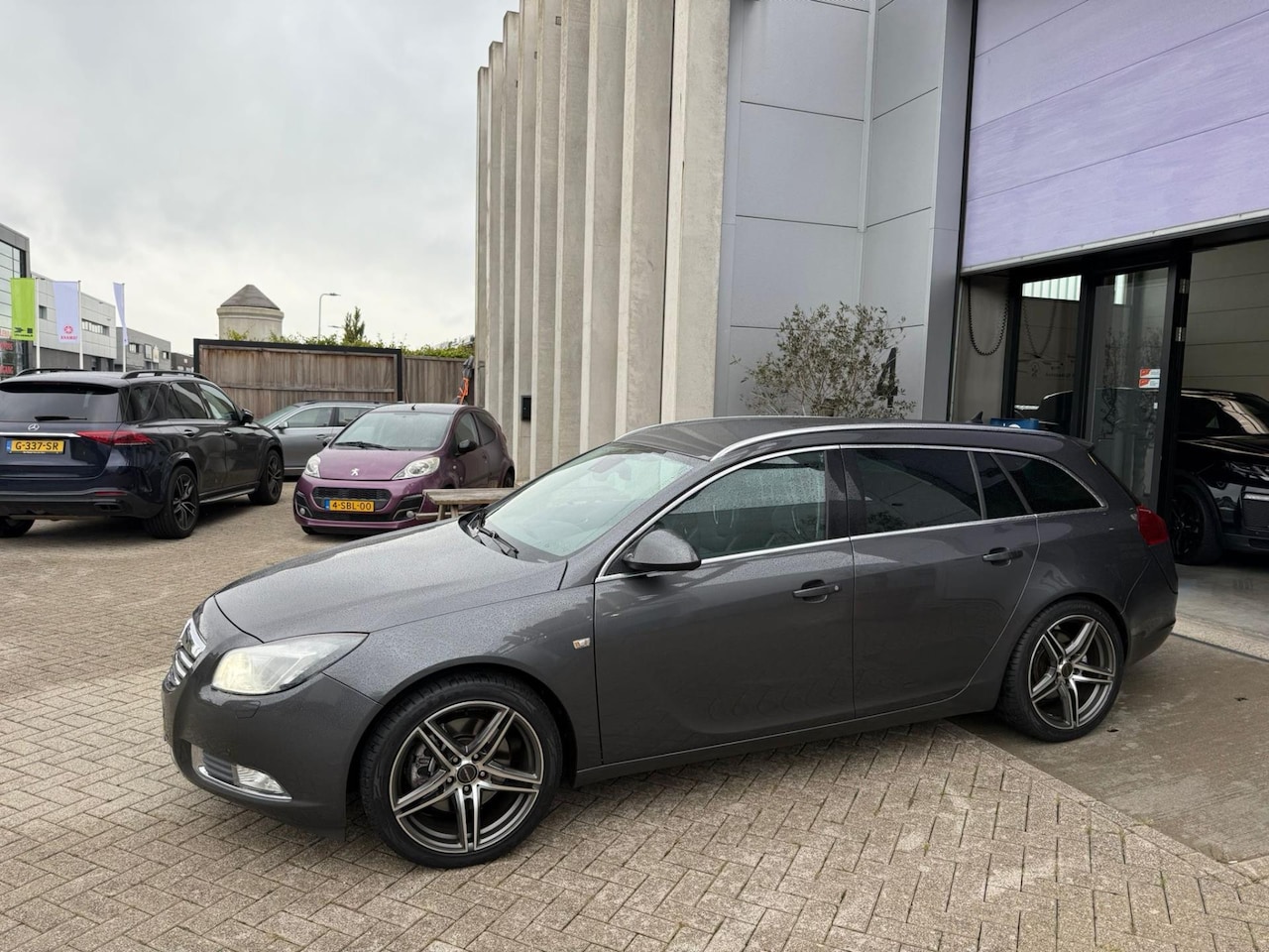 Opel Insignia Sports Tourer - 2.8 T Sport 4x4 RECARO! INRUIL MOGELIJK! - AutoWereld.nl