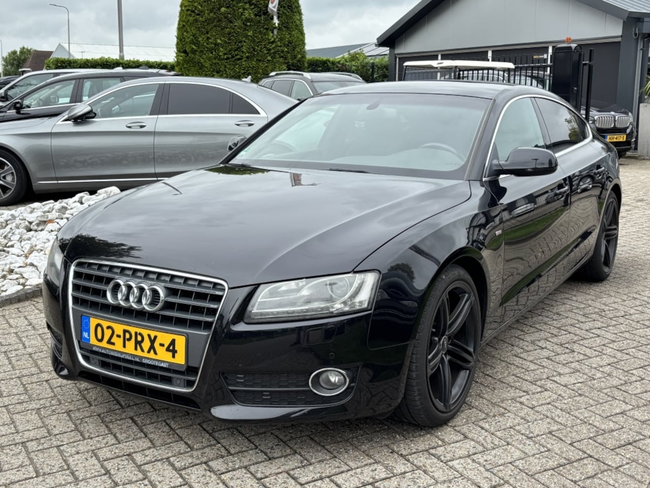 Audi A5 Sportback - 2.0 TFSI S-Line 2011 Zwart - AutoWereld.nl