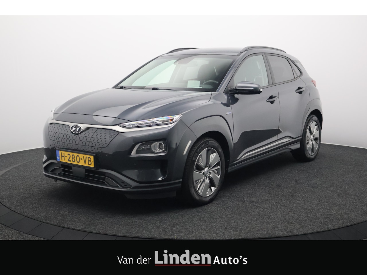 Hyundai Kona Electric - EV Premium 64 kWh | Stoelverwarming | Adaptieve Cruise | Camera | Carplay | HUD - AutoWereld.nl