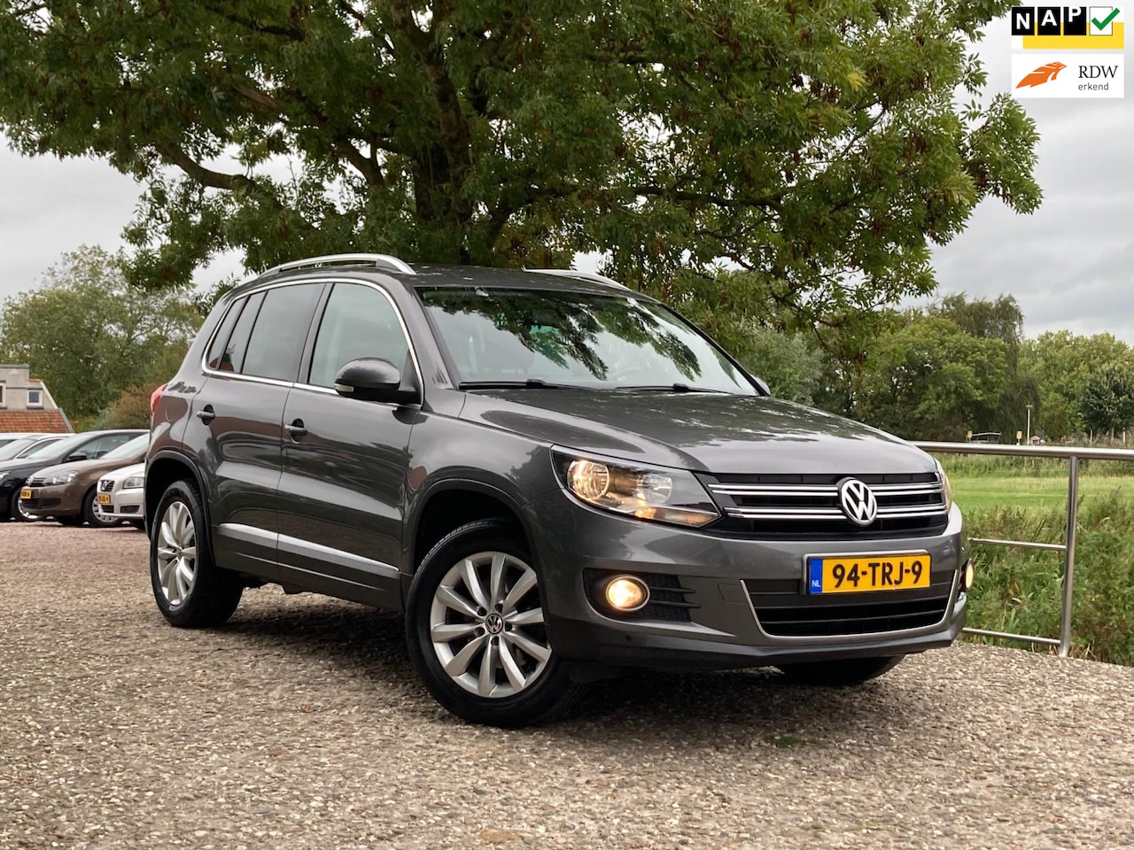 Volkswagen Tiguan - 1.4 TSI Sport&Style | Navi + Clima + Cruise nu €7.975,-!! - AutoWereld.nl