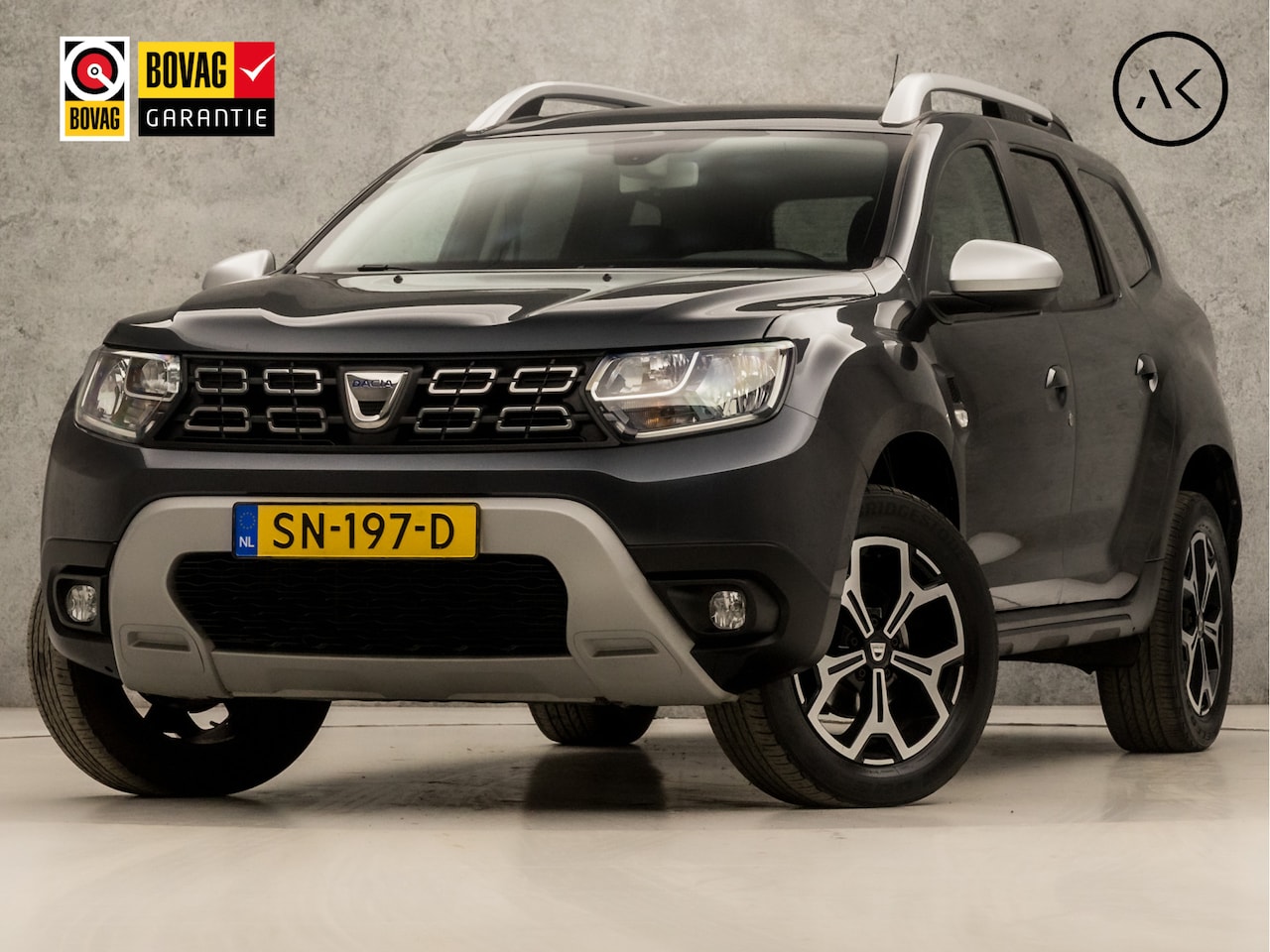 Dacia Duster - 1.2 TCe Prestige Sport (NAVIGATIE, CAMERA, AIRCO, GETINT GLAS, LM VELGEN, SPORTSTOELEN, TR - AutoWereld.nl