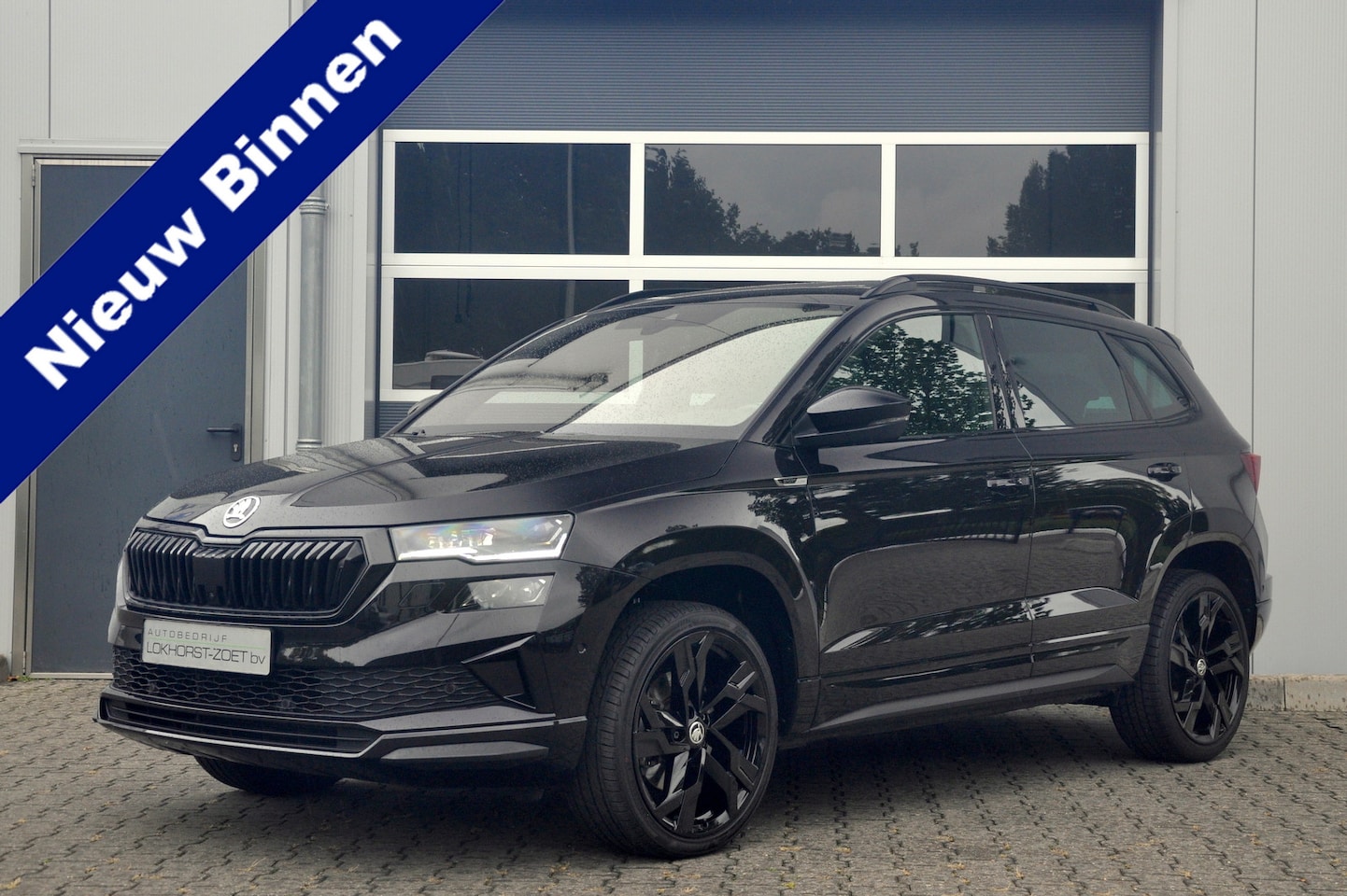 Skoda Karoq - 1.5 TSI ACT Sportline Business Automaat | Pano | ACC | Trekhaak - AutoWereld.nl