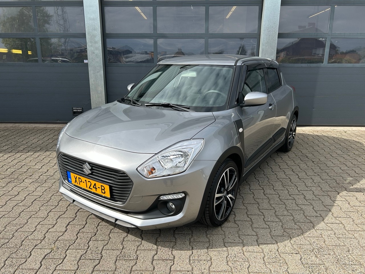 Suzuki Swift - 1.2 DualJet 90pk Sportline - AutoWereld.nl