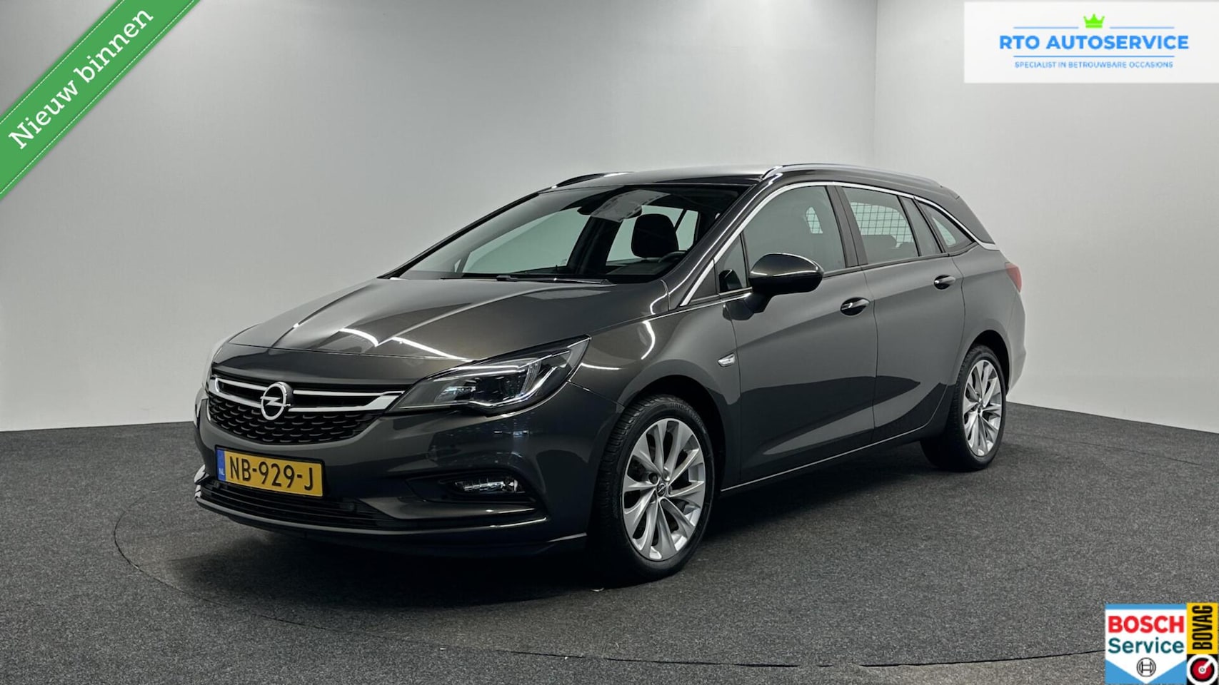 Opel Astra Sports Tourer - 1.4 Business Executive CAMERA TREKHAAK CRUISE - AutoWereld.nl