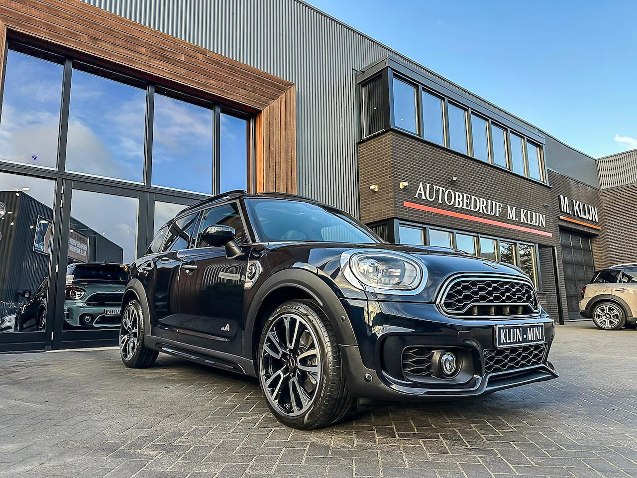 MINI Countryman - Mini 2.0 Cooper S E ALL4 Chili John Cooper Works 224pk/Pano/Lounge leer/19"Jcw - AutoWereld.nl