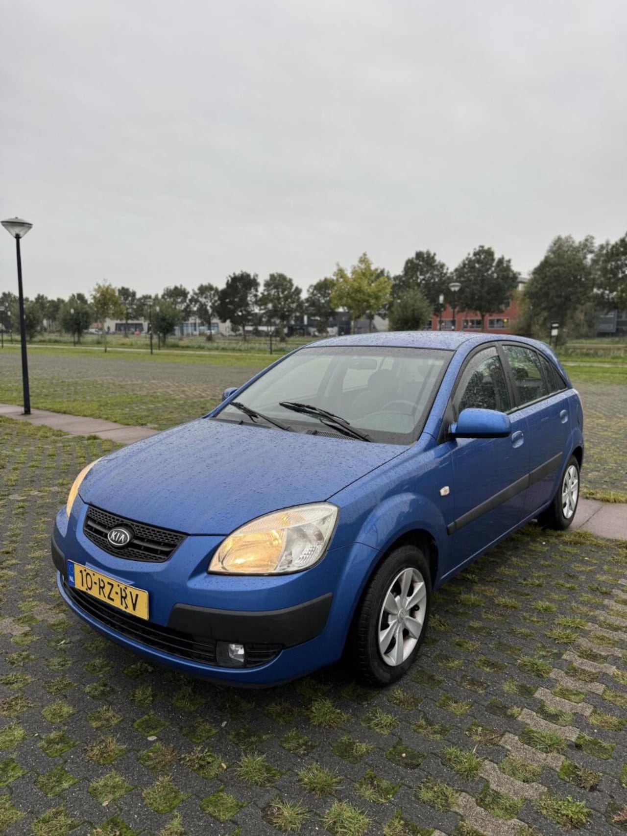 Kia Rio - 1.4 5-deurs Lage KM Airco Elek pakket Bluetooth - AutoWereld.nl