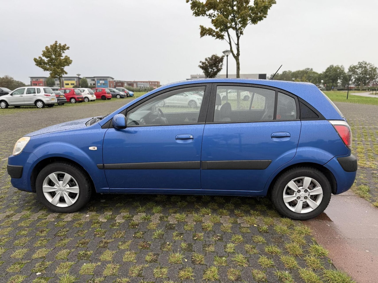 Kia Rio - 1.4 5-deurs Lage KM Airco Elek pakket Bluetooth - AutoWereld.nl