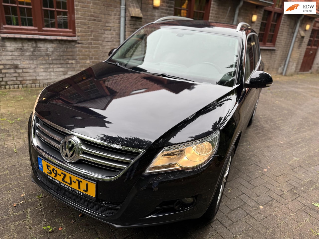 Volkswagen Tiguan - 1.4 TSI Sport&Style 4Motion Schitterende Auto - AutoWereld.nl