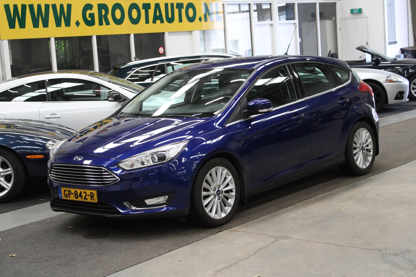 Ford Focus - 1.5 Titanium Edition Airco, Cruise Control, Navigatie, Trekhaak, Stuurbekrachtiging - AutoWereld.nl