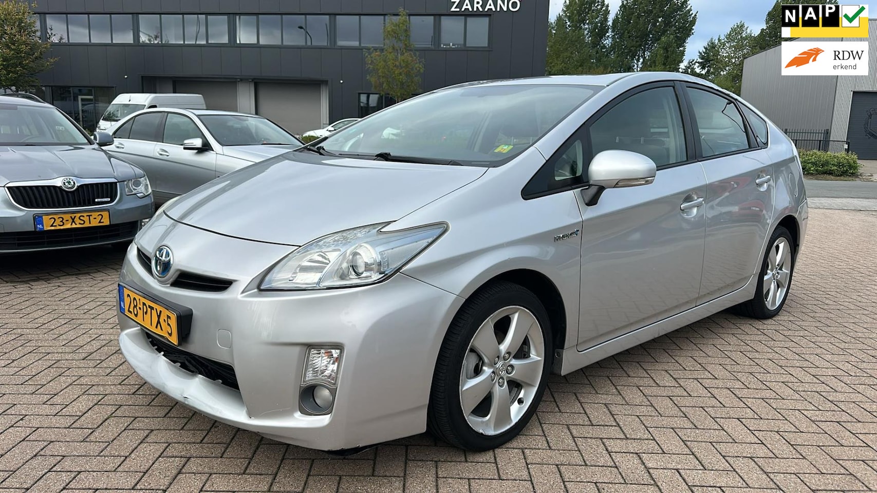 Toyota Prius - 1.8 Aspiration NAVI/CRUISE - AutoWereld.nl