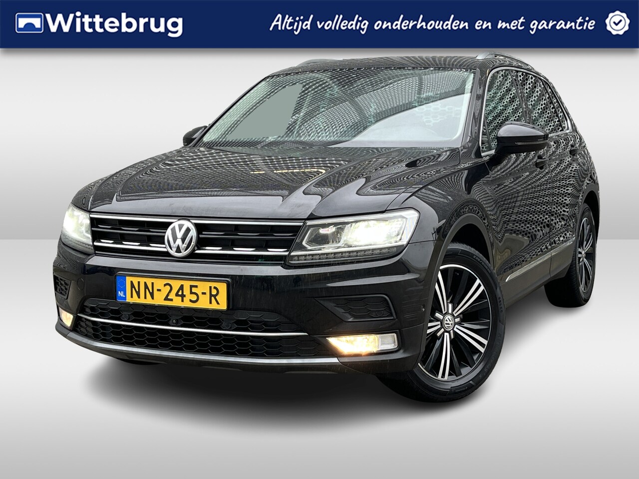 Volkswagen Tiguan - 1.4 TSI 150pk DSG Highline / Panoramadak / Leder Vienna / Memory Seats / Virtual Cockpit / - AutoWereld.nl