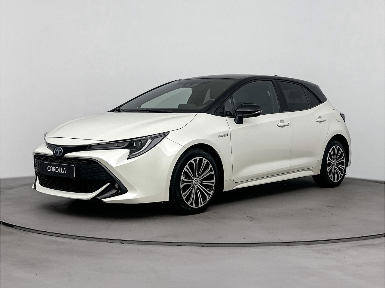 Toyota Corolla - 1.8 Hybrid Style | All weatherbanden | Stoelverwarming | Climate controle | - AutoWereld.nl