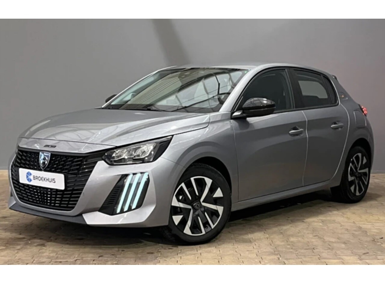 Peugeot 208 - Style | Dashboard en deurpanelen in kunststof met carboneffect | Ecoled koplampen | Elektr - AutoWereld.nl