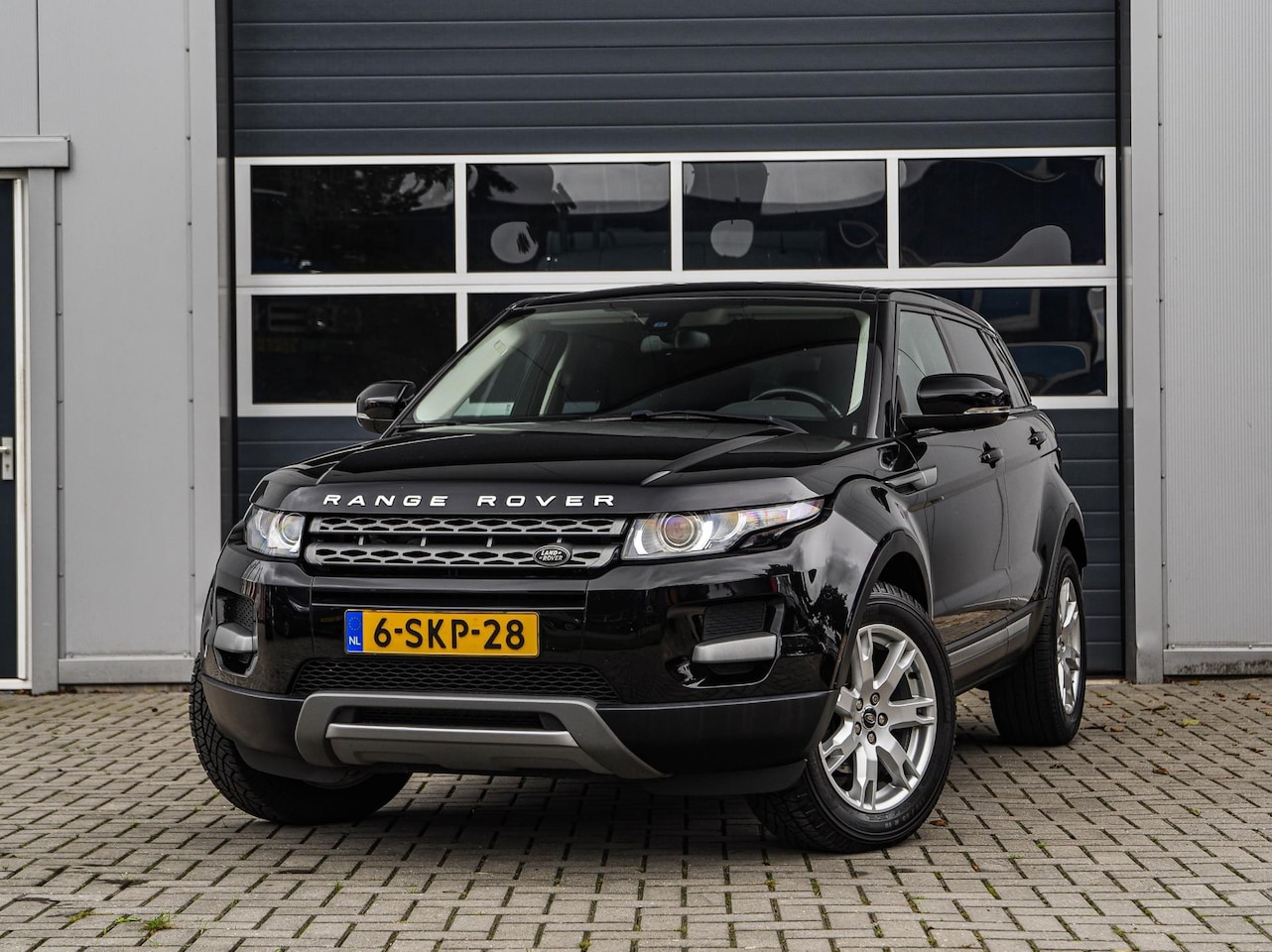 Land Rover Range Rover Evoque - 2.2 eD4 2WD Pure | Leder | Navi | Stoelverwarming | Meridian | Climate control | Cruise co - AutoWereld.nl