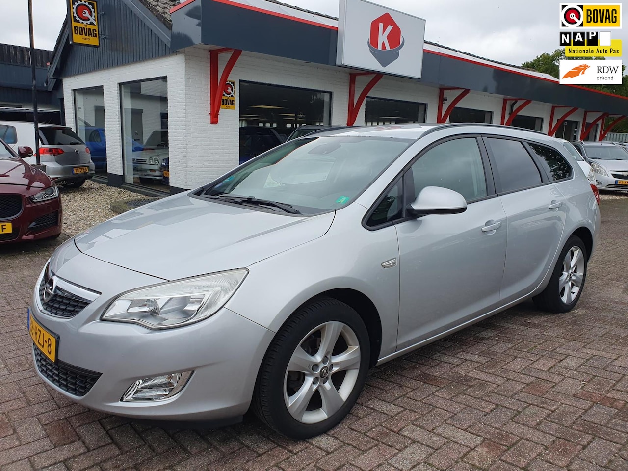 Opel Astra Sports Tourer - 1.4 Edition NAVI/ECC/PDC BJ 2011 - AutoWereld.nl