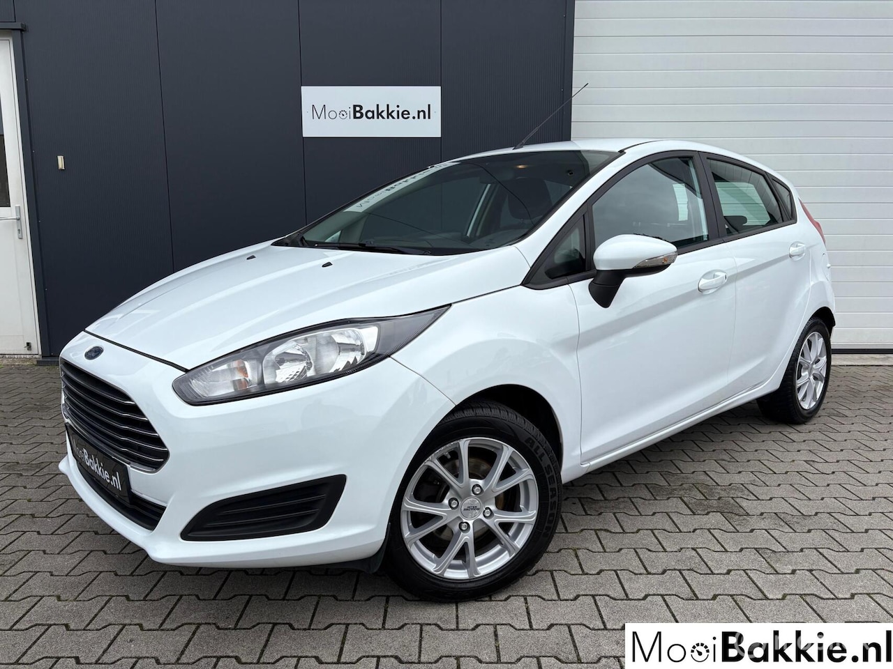 Ford Fiesta - 1.0 80pk 5-Drs / Navi / Airco / All-seasons - AutoWereld.nl