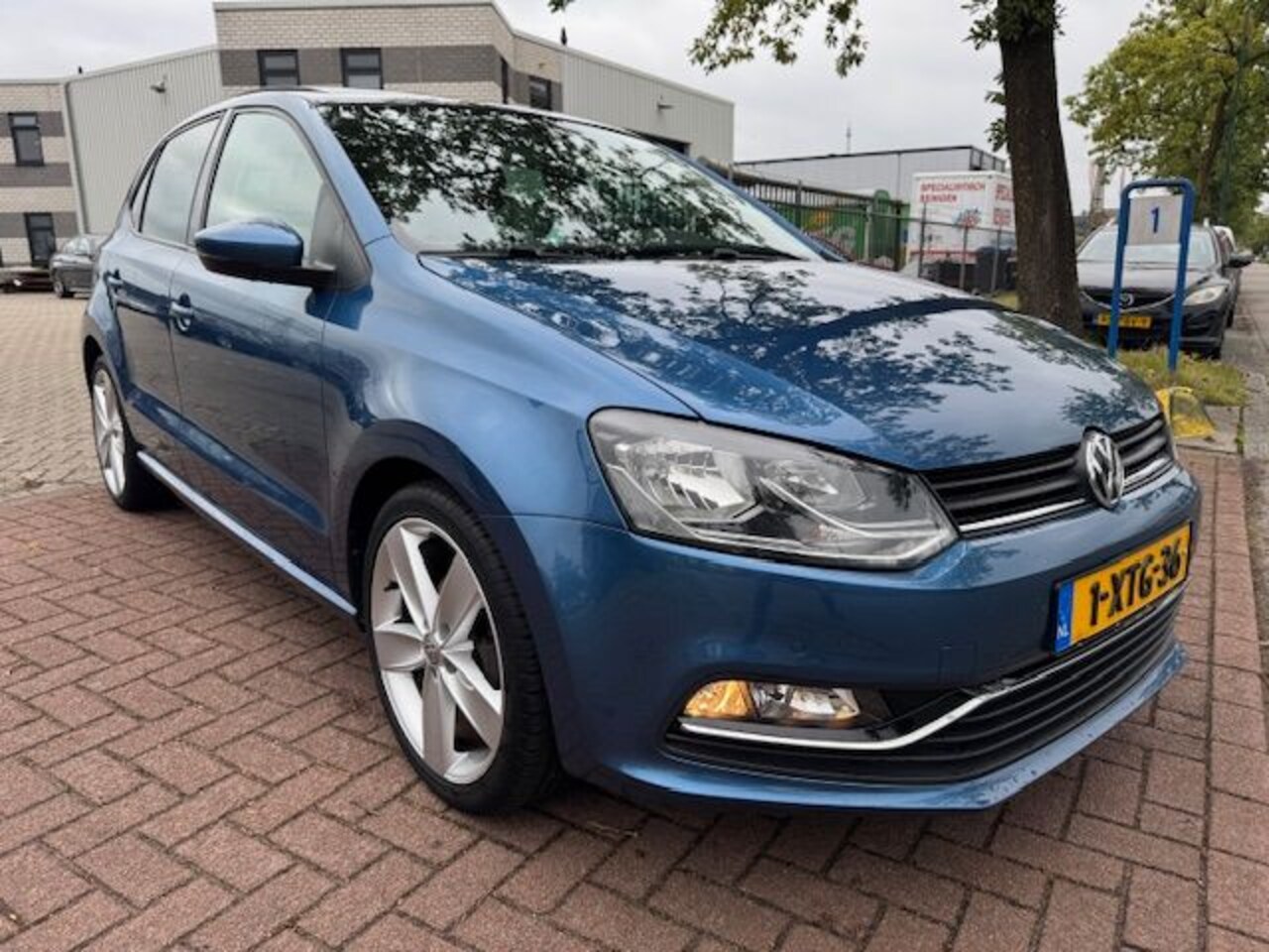 Volkswagen Polo - 1.2 TSI 5deurs Highline Airco/ECC,Cruisecontrol,Navigatie,Panoramadak - AutoWereld.nl