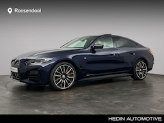 BMW i4 - M50 84 kWh M-Sport Pro | 20 inch | Schuifdak | Extra getint glas achter | Harman Kardon |