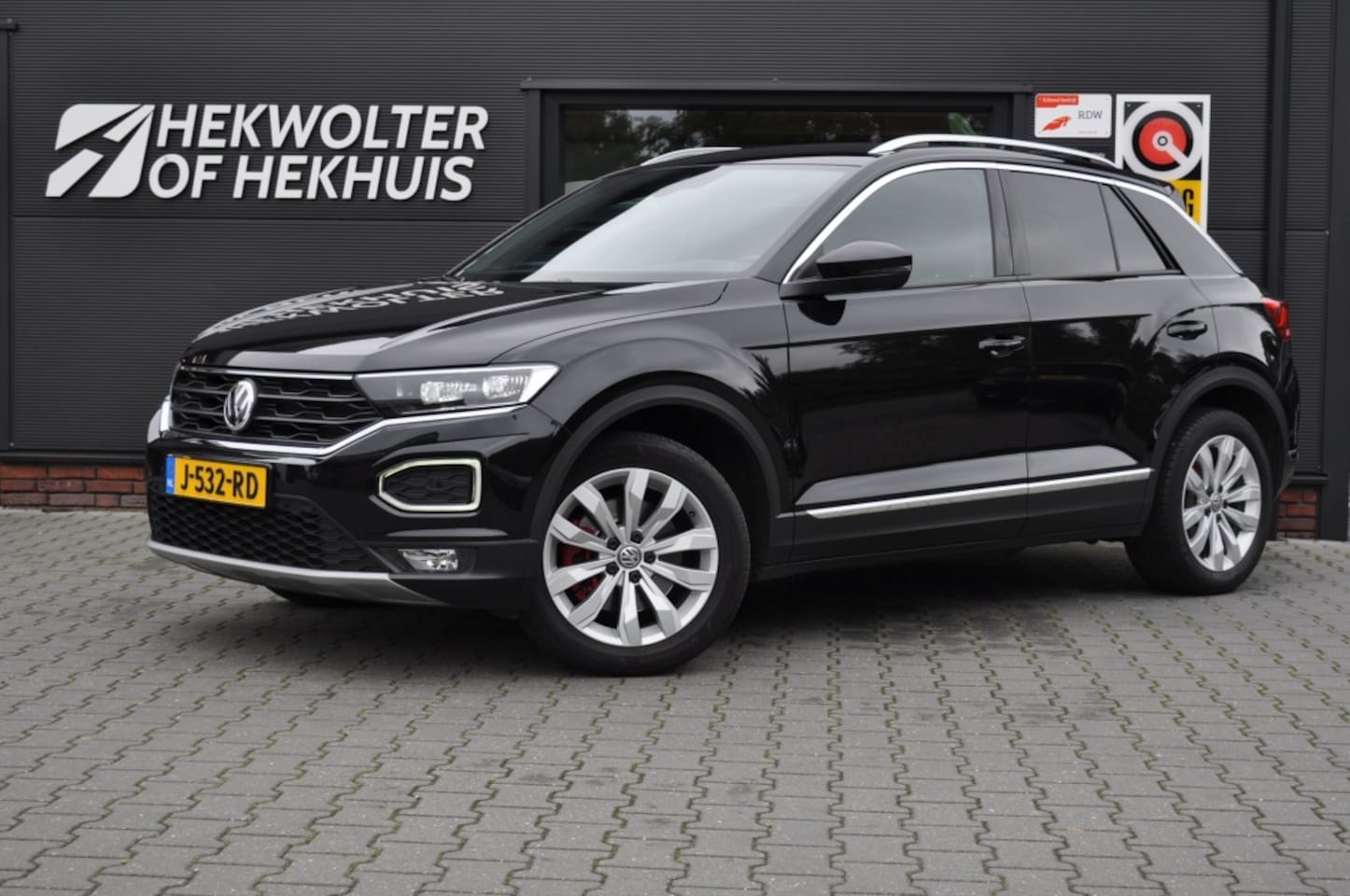 Volkswagen T-Roc - 1.5 TSI Sport | Navi | Winterpakket | Trekhaak - AutoWereld.nl
