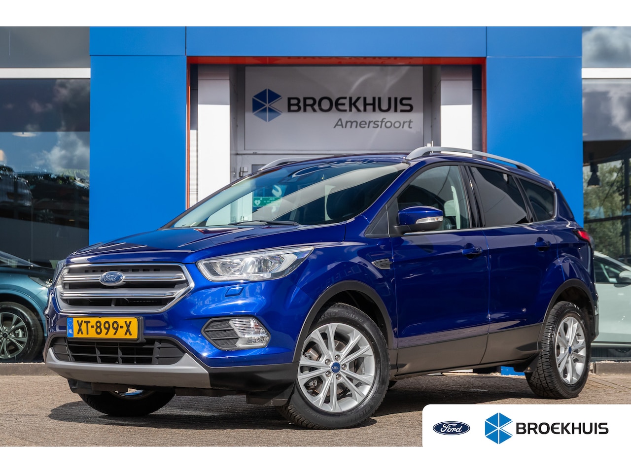 Ford Kuga - 1.5 EcoBoost Titanium | Trekhaak | Stuur/stoel verwarming | Navi | Keyless | Cruise contro - AutoWereld.nl