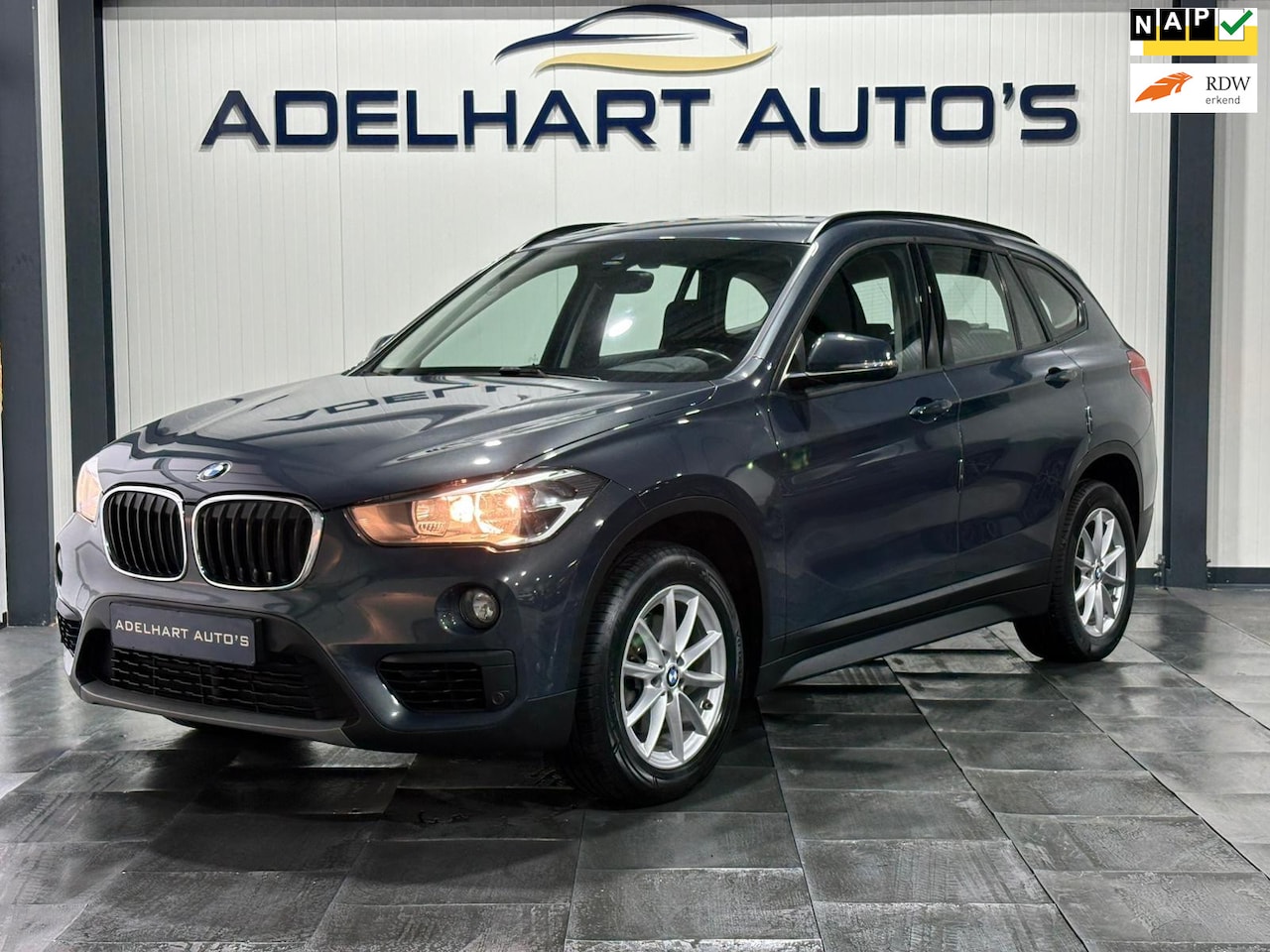 BMW X1 - SDrive18i Automaat / Navigatie full map / Cruise control / Climate Control / etc.. - AutoWereld.nl