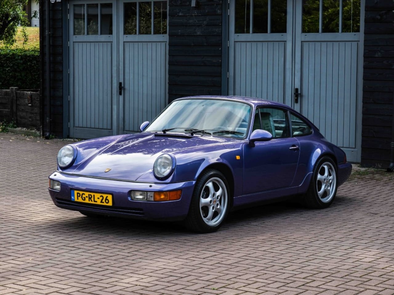 Porsche 911 - Carrera 2 Coupe Violet Blue Metallic - AutoWereld.nl