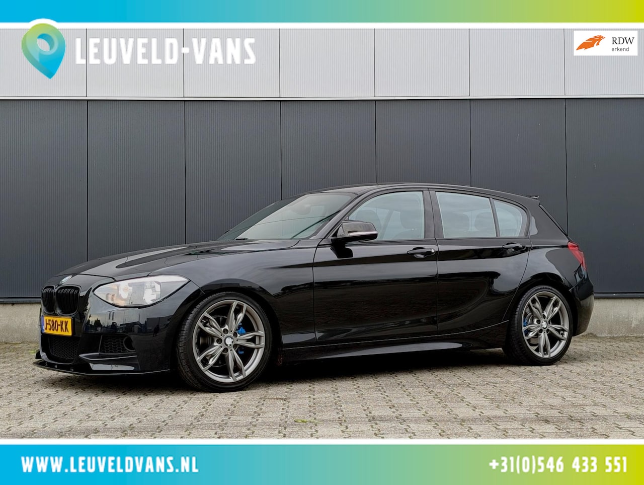 BMW 1-serie - 116i M PAKKET 5 DEURS CRUISE AIRCO WEGKLAPBARE TREKHAAK - AutoWereld.nl