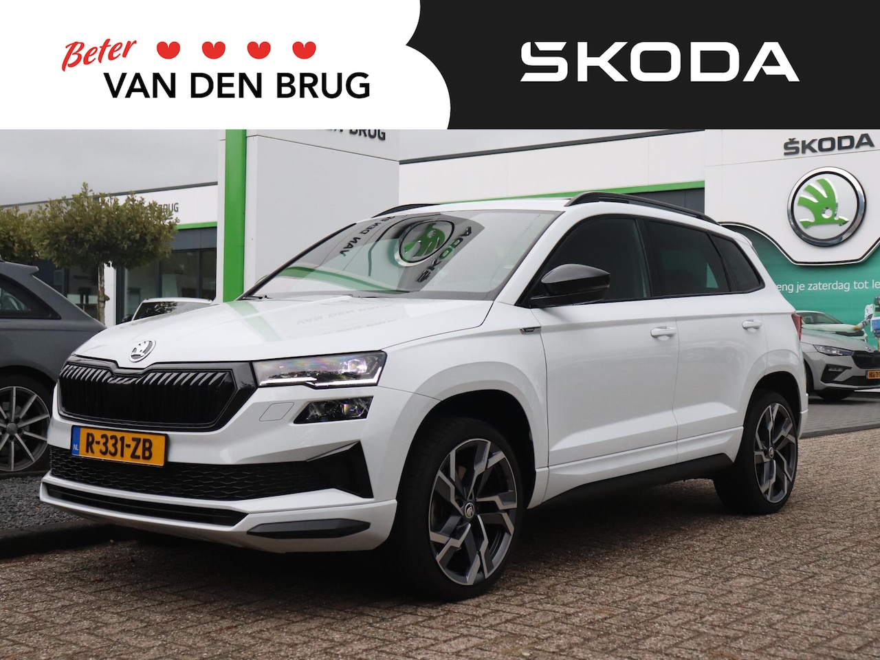 Skoda Karoq - 1.5 TSI 150pk AUTOMAAT Sportline Business | Trekhaak | Panoramadak | Elektrische achterkle - AutoWereld.nl