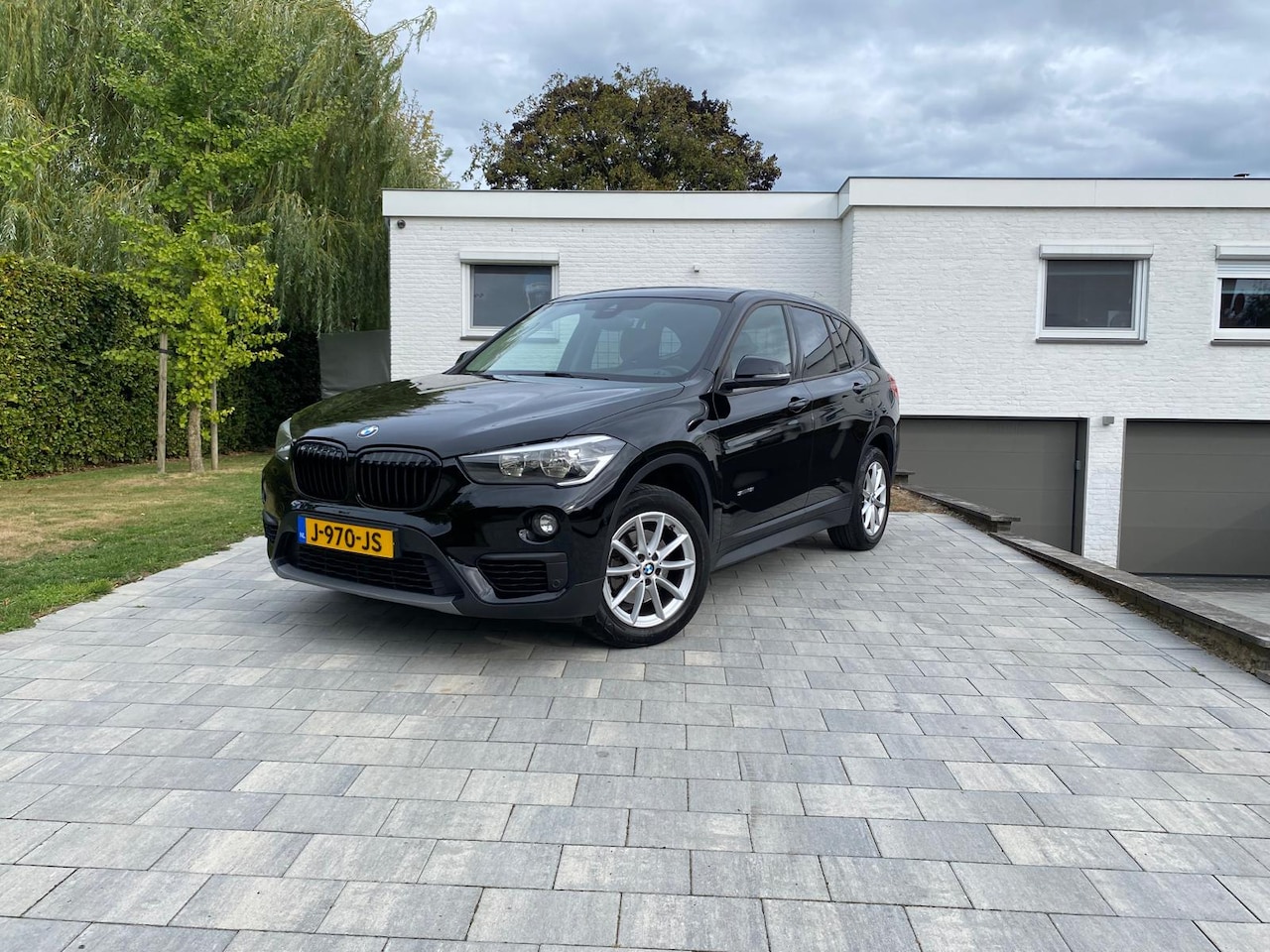 BMW X1 - 1.8i sDrive Centennial Executive | Cruise control | Trekhaak | Bluetooth | - AutoWereld.nl