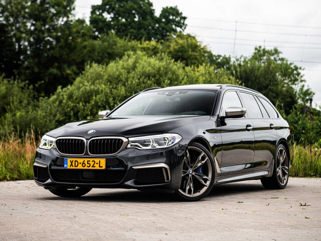 BMW 5-serie Touring - M550d xDrive High Executive M550d xDrive High Executive - AutoWereld.nl