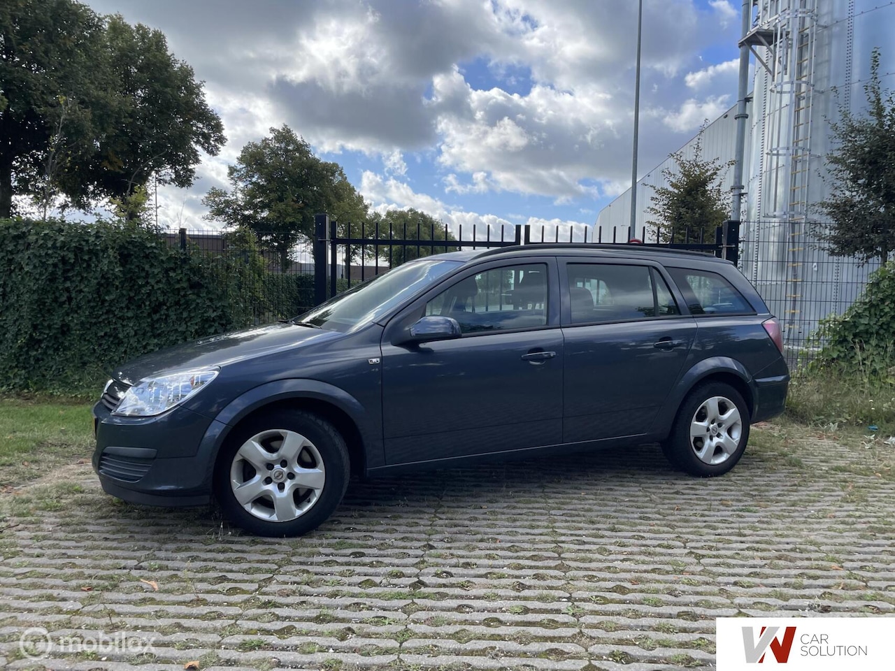 Opel Astra Wagon - 1.9 CDTi Business NAP NAVI CRUISE TREKHAAK - AutoWereld.nl
